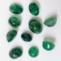 A Parcel of 10 Colombian Emerald Cabochons. 10.08 Carats Total.