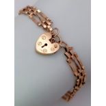 A Vintage 9K Yellow Gold Gate Bracelet with Heart Clasp. 18cm. 3.68g weight.