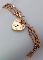 A Vintage 9K Yellow Gold Gate Bracelet with Heart Clasp. 18cm. 3.68g weight.