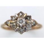 A Vintage 9K Yellow Gold Diamond Cluster Ting. Size H. 1.05g weight.