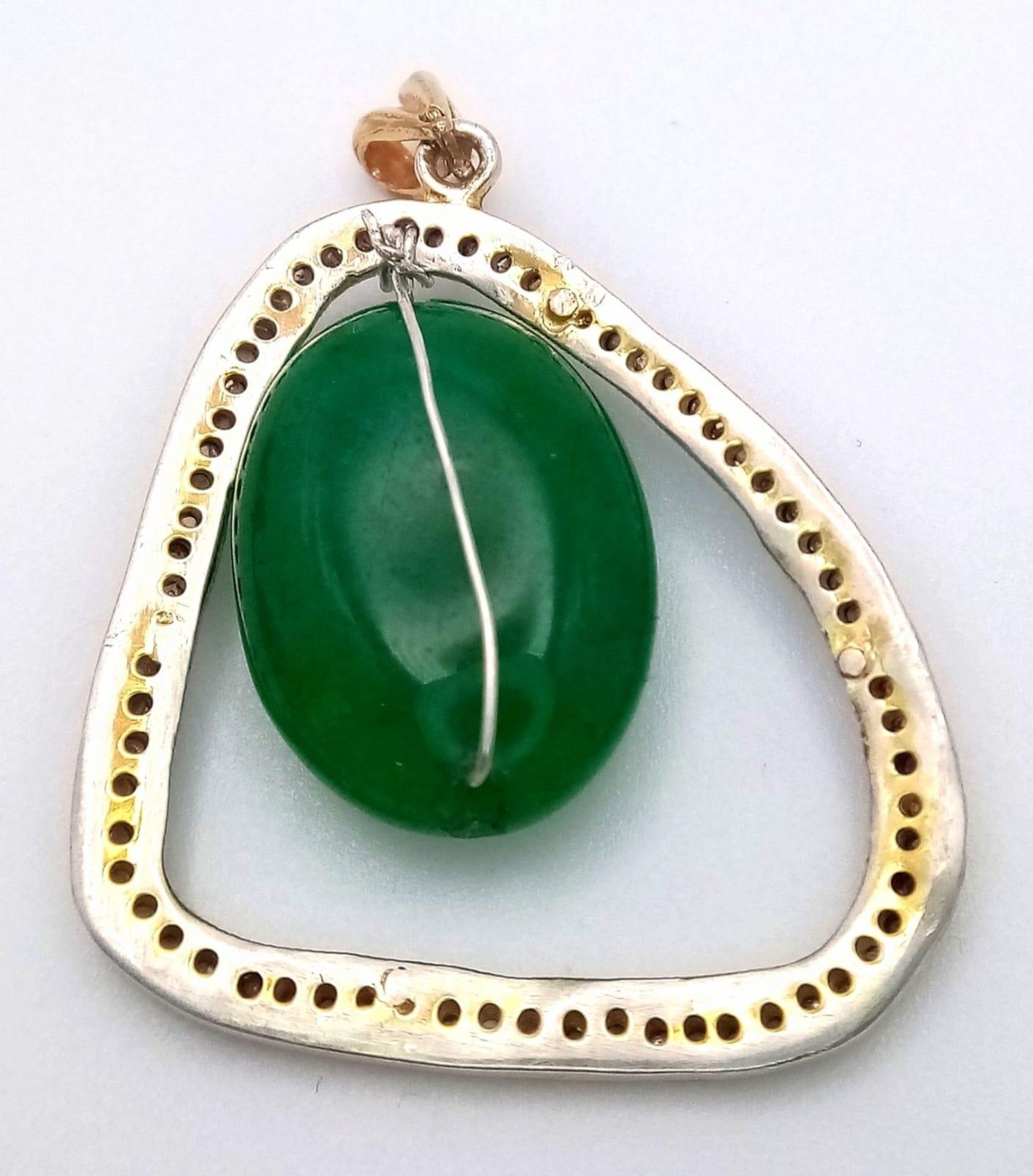A Jade and Diamond Pendant on Yellow Metal. 4cm. 4.75g weight. - Image 2 of 5