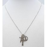 A 925 silver necklace with 2 cross and initial L pendants. Total weight 2.65G. Total length 54cm.