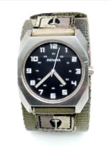 A Men’s Nixon Military Watch. 38mm Including Crown on Camouflage Combat Strap. Scout Model. Full