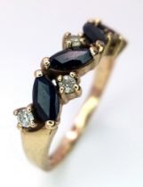 A Vintage 9K Yellow Gold Sapphire and White Stone Ring. Size O. 3.2g total weight.