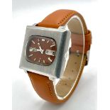 A Vintage Seiko 5 Automatic Gents Watch. Brown leather strap. Stainless steel 'TV' Style case - 37mm