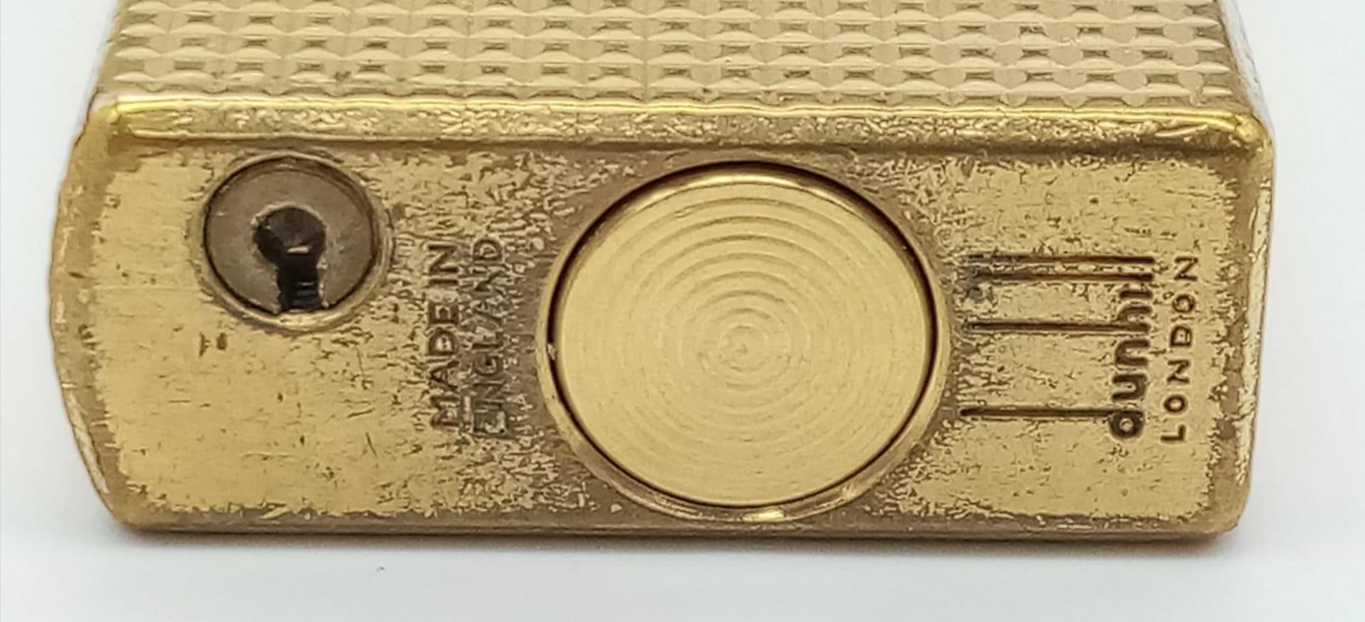 A Vintage Dunhill Gold Plated 70 Lighter. Textured exterior - 6cm x 3cm. In need of flint and gas. - Image 4 of 8