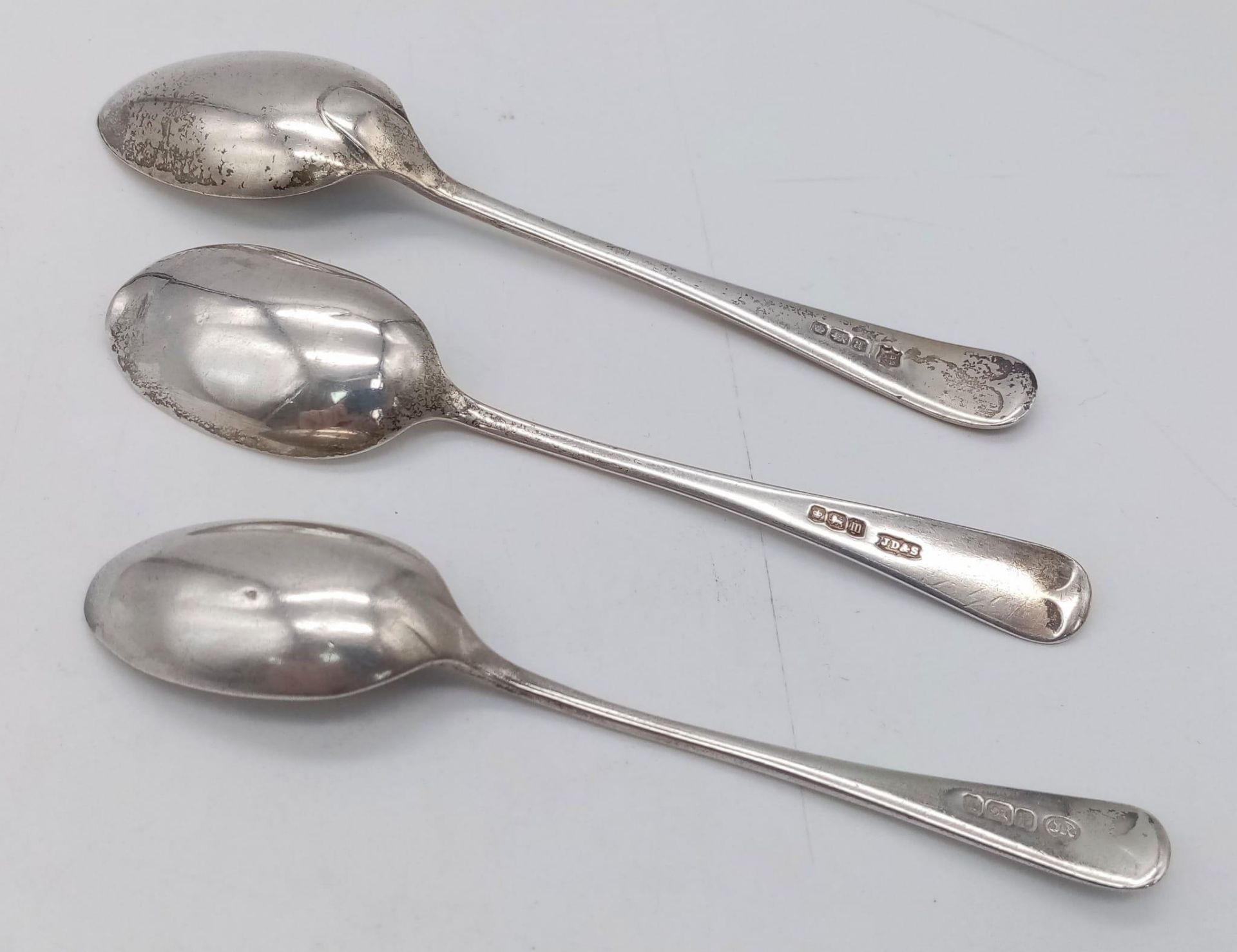 A collection of 3 antique sterling silver spoons with multiple sizes. Full Sheffield hallmarks 1929,