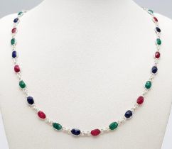 A Ruby, Emerald and Sapphire Necklace on 925 Silver. 54cm length, 0.7cm gemstones, 15.53g total