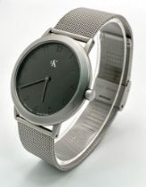 A CK CALVIN KLEIN WATCH FULL WORKING ORDER WITH ORIGINAL BOX AND PAPERS H 4001
