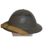 WW2 1943 Dated British Mk II Helmet, with insignia of the Gurkha Brigade. The makers stamp RO & CO