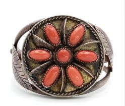 A Vintage Native American (Navajo) Silver (high grade) and Red Coral Cuff Bracelet. Ornate feather