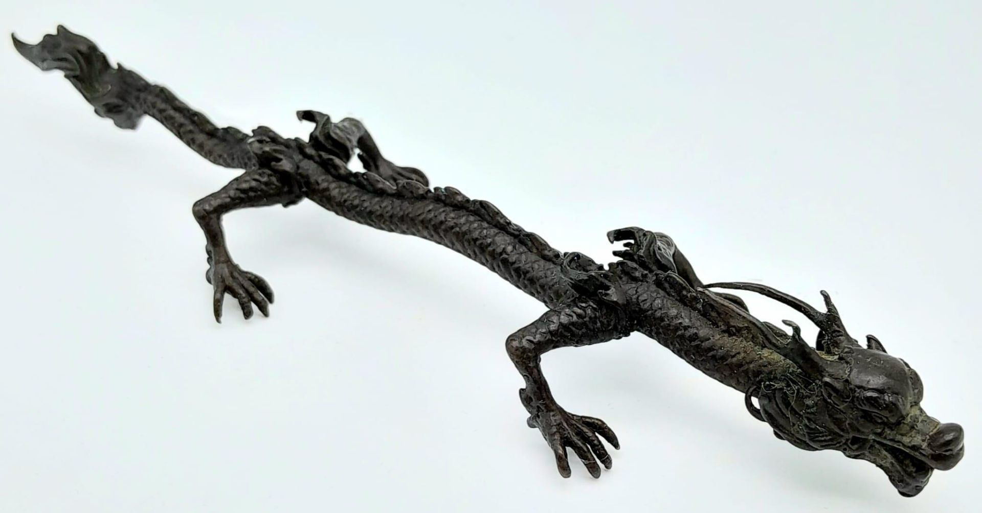 An Antique Japanese Bronze Dragon Ornament 15.5cm Length.