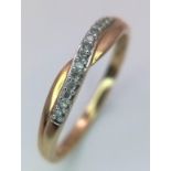 A 9K YELLOW GOLD DIAMOND CROSSOVER RING 1.2G SIZE P SC 4006