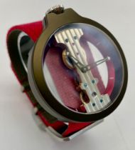 A Verticale Mechanical Top Winder Unisex Watch. Bright red textile strap. Rose gold tone ceramic