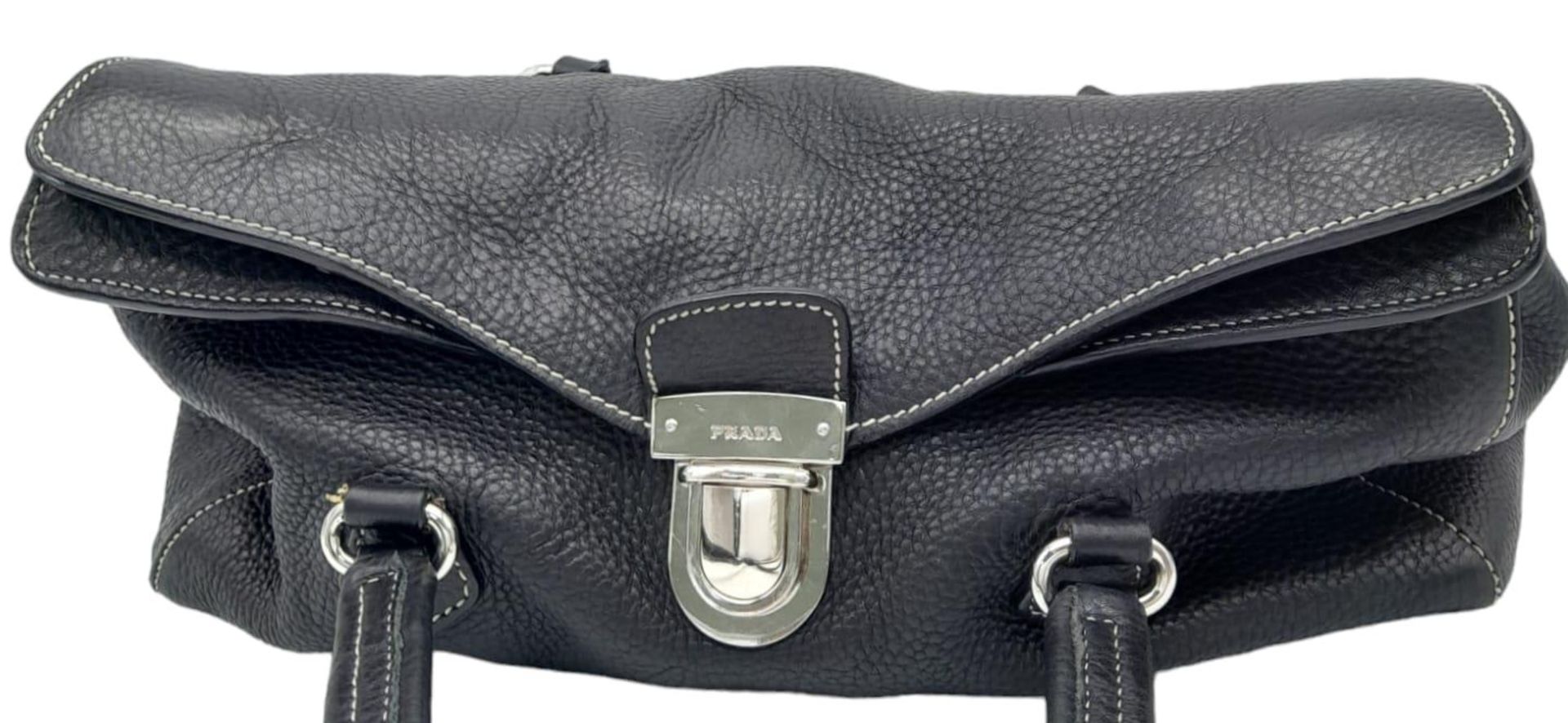 A Prada Black Vitello Shoulder Bag. Leather exterior with silver-toned hardware, two straps, push - Image 2 of 10