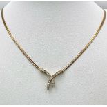 A 9K Yellow Gold Herringbone Necklace with an Attached Eternal Crossover Diamond Pendant. 40cm