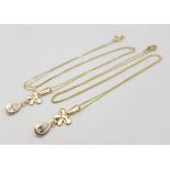 Two 9K Yellow Gold Disappearing Necklaces with White Stone Pendants. 40cm necklace lengths. 1.45g