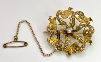An Antique 10K Yellow Gold Diamond and Seed Pearl Brooch. 0.25ct brilliant round cut diamond