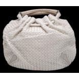 A Bottega Veneta Cream Hobo Bag. Intracciato (woven) leather exterior with reptilian handles and