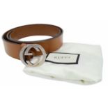 A Gucci Interlocking GG Signature Leather Belt. Brown Calfskin Leather, Silver Tone Hardware.