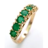 A 9K YELLOW GOLD EMERALD SET BAND RING 2.3G SIZE O SC 4058