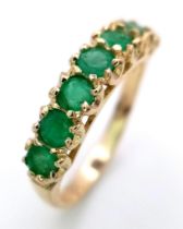 A 9K YELLOW GOLD EMERALD SET BAND RING 2.3G SIZE O SC 4058