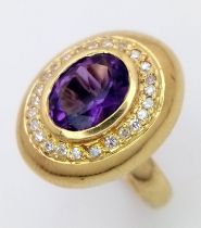 A DESIGNER 18K GOLD RING WITH TOP QUALITY AMETHYST CENTRE STONE SURROUNDED BY DIAMONDS . 6.4gms size