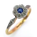 A VINTAGE 18K GOLD SAPPHIRE AND DIAMOND RING WITH PLATINUM SETTING . 1.9gms size O