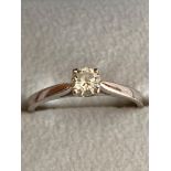 Designer 18 carat WHITE GOLD and DIAMOND SOLITAIRE RING. Having a quality clear white 0.25 carat