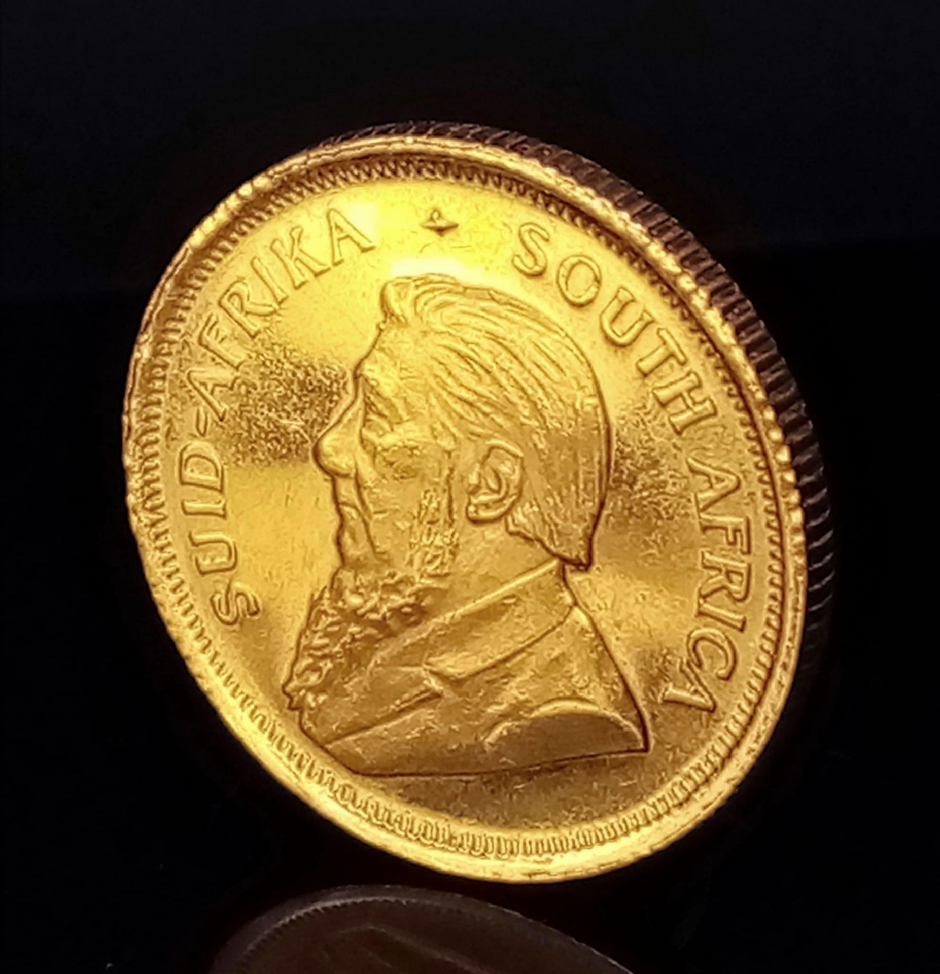 A 22K Gold 1/10 Ounce Krugerand Coin. 3.4g weight,