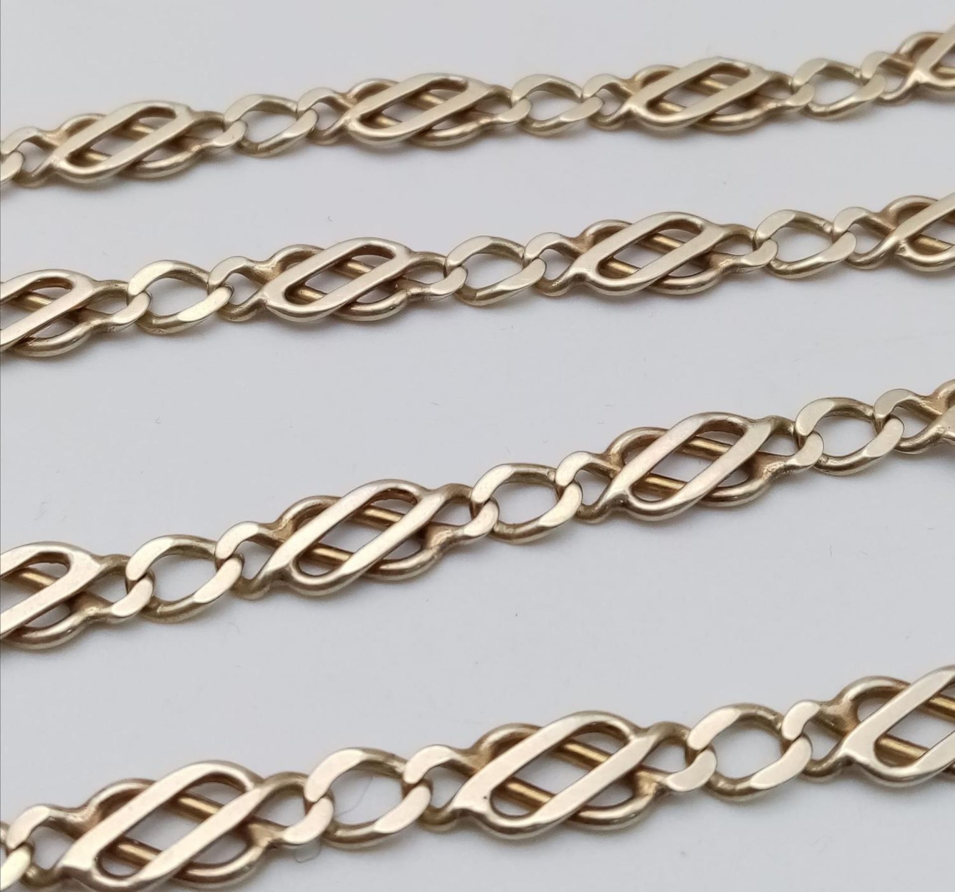 A 9k yellow gold fancy link chain. 17" length. 16.8g - Image 3 of 4