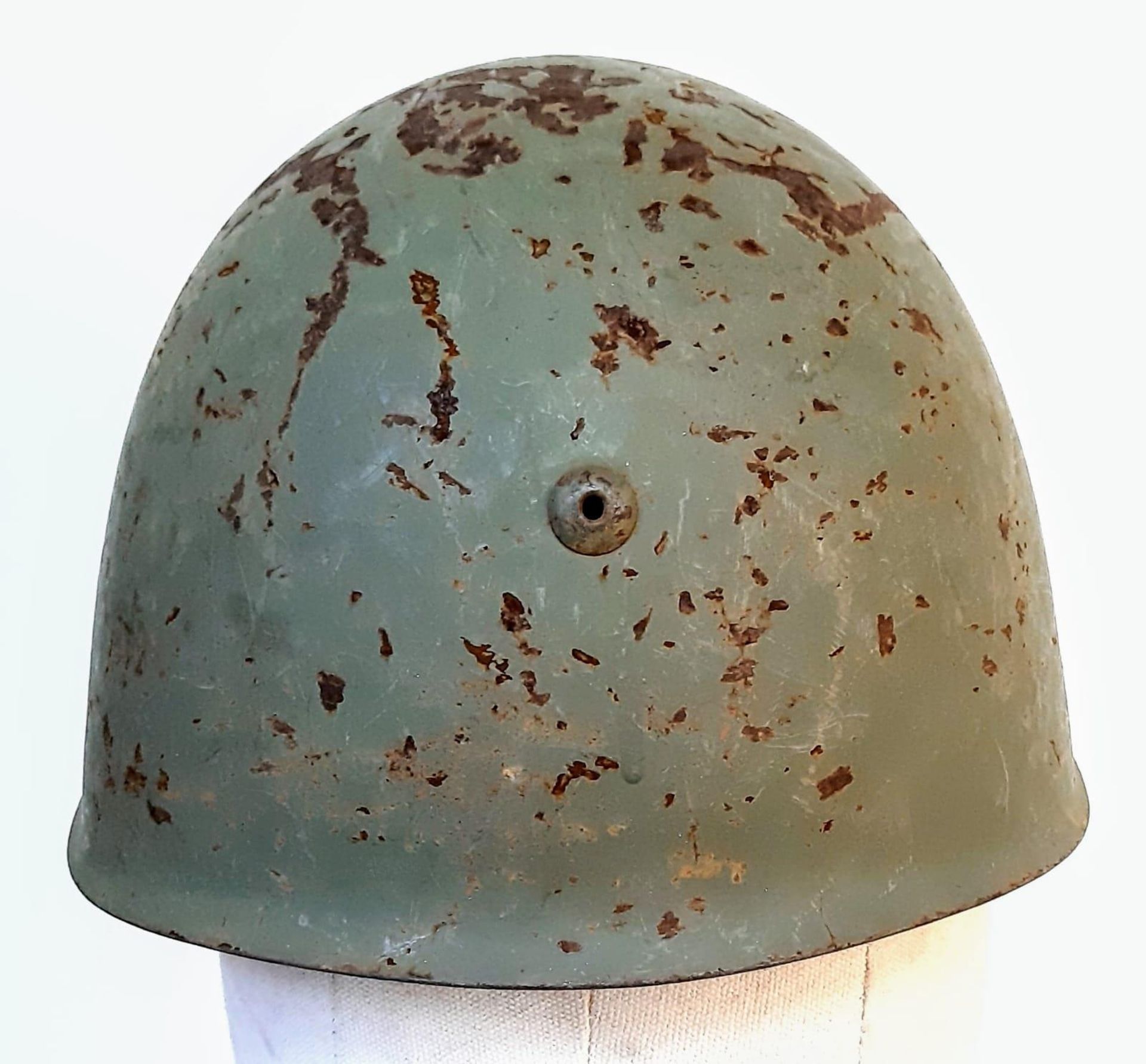 A WW2 Italian M33 Helmet with insignia of the Coastal Artillery. - Image 3 of 5