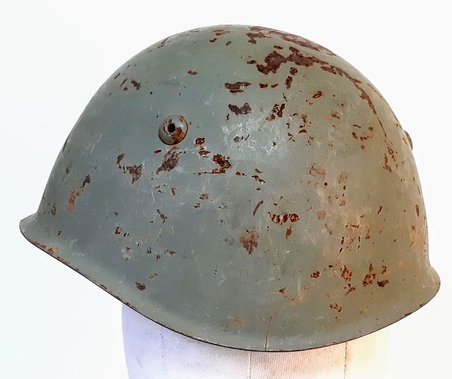 A WW2 Italian M33 Helmet with insignia of the Coastal Artillery. - Image 2 of 5