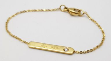 A VERY CUTE 18K YELLOW GOLD DIAMOND SET BABY BRACELET FOR YOUR FIRST BORN, ENGRAVED WITH THE