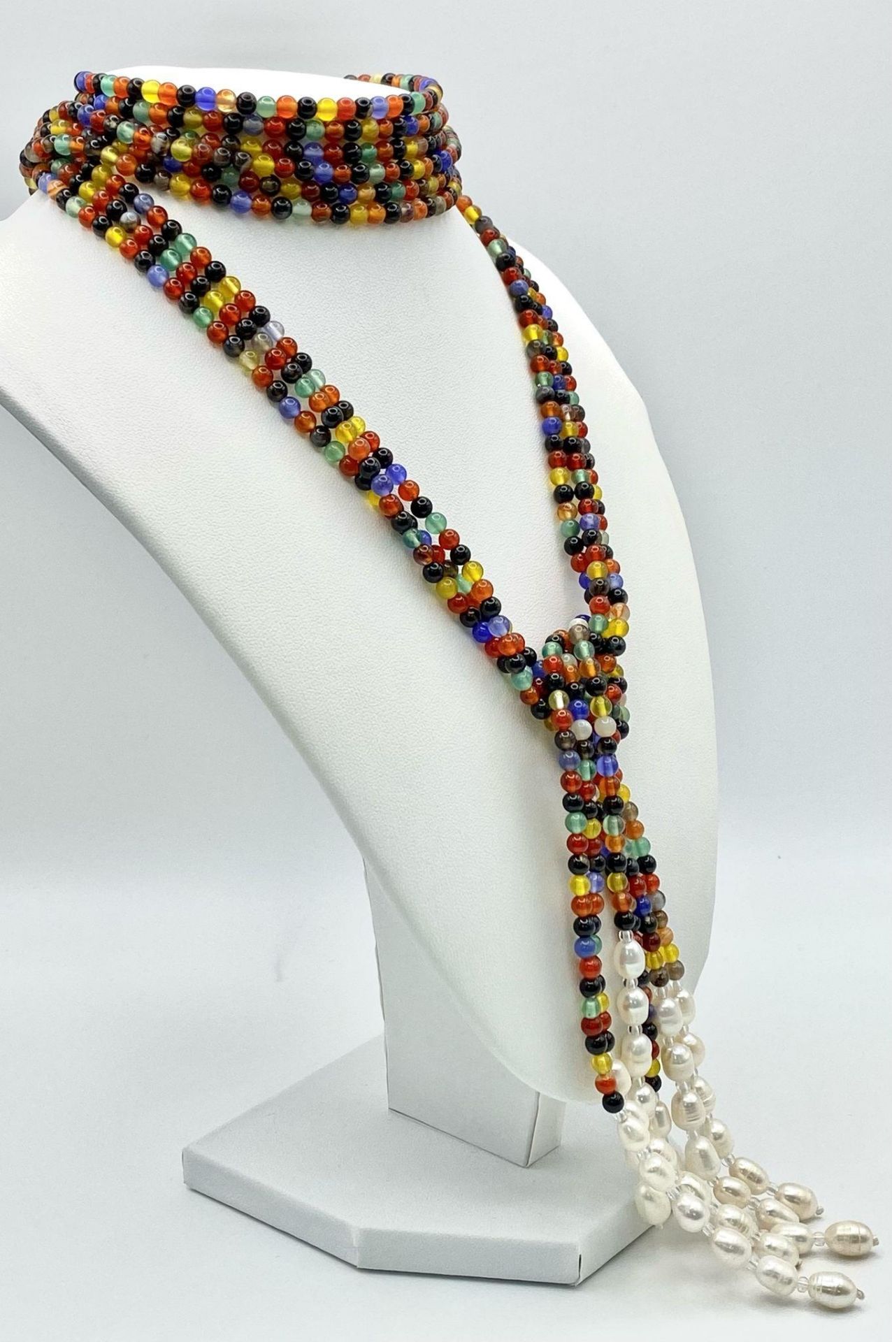 A very interesting necklace consisting of three very long (125 cm) strands of multicoloured beads - Image 3 of 5