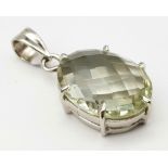 An Oval Brazilian Green Amethyst 925 Silver Pendant. A faceted 25ct Amethyst. 3cm. Comes with a