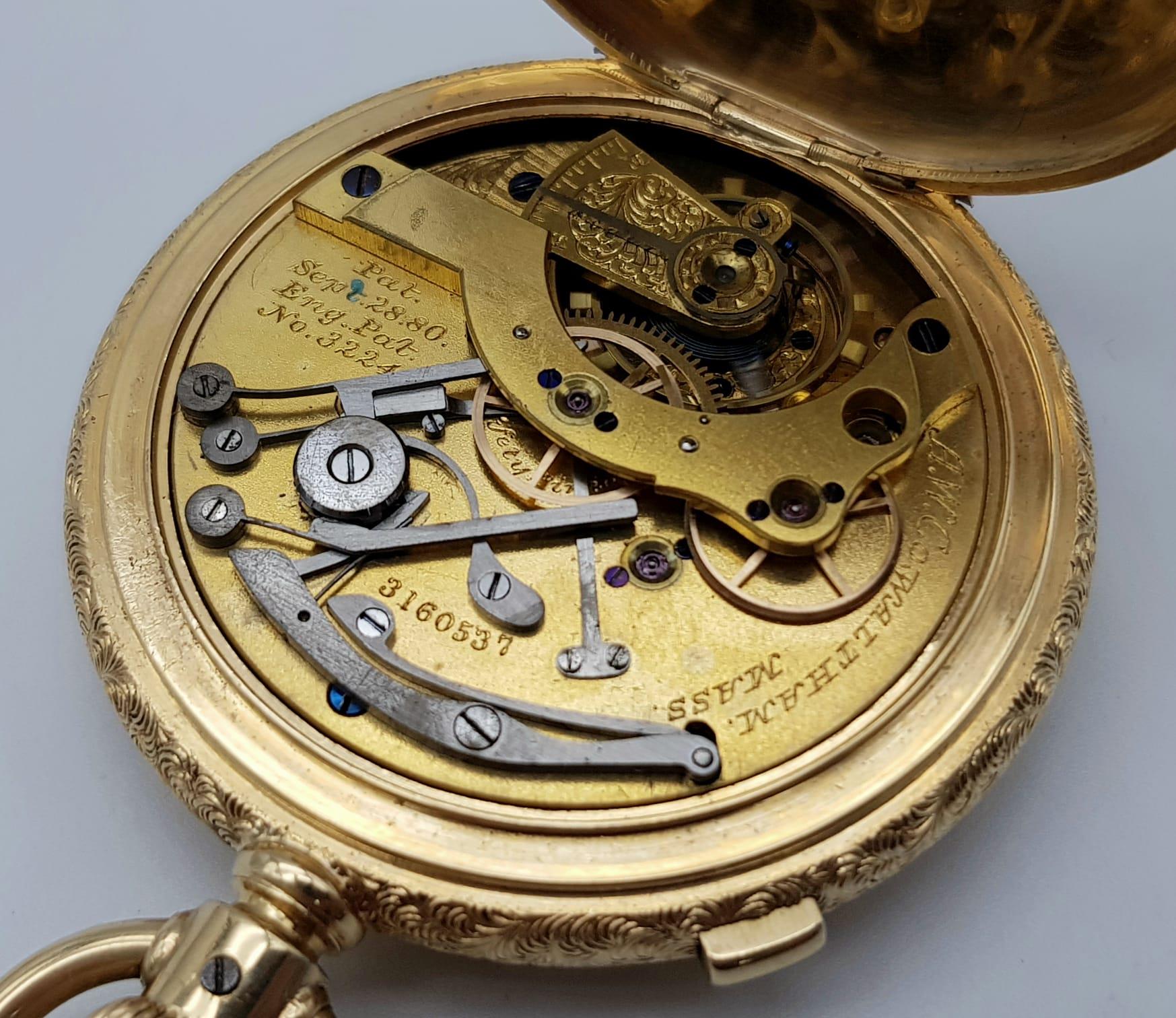 An Antique Waltham 18K Gold Full Hunter Pocket Watch. The case is ornately decorated in a floral - Image 8 of 13