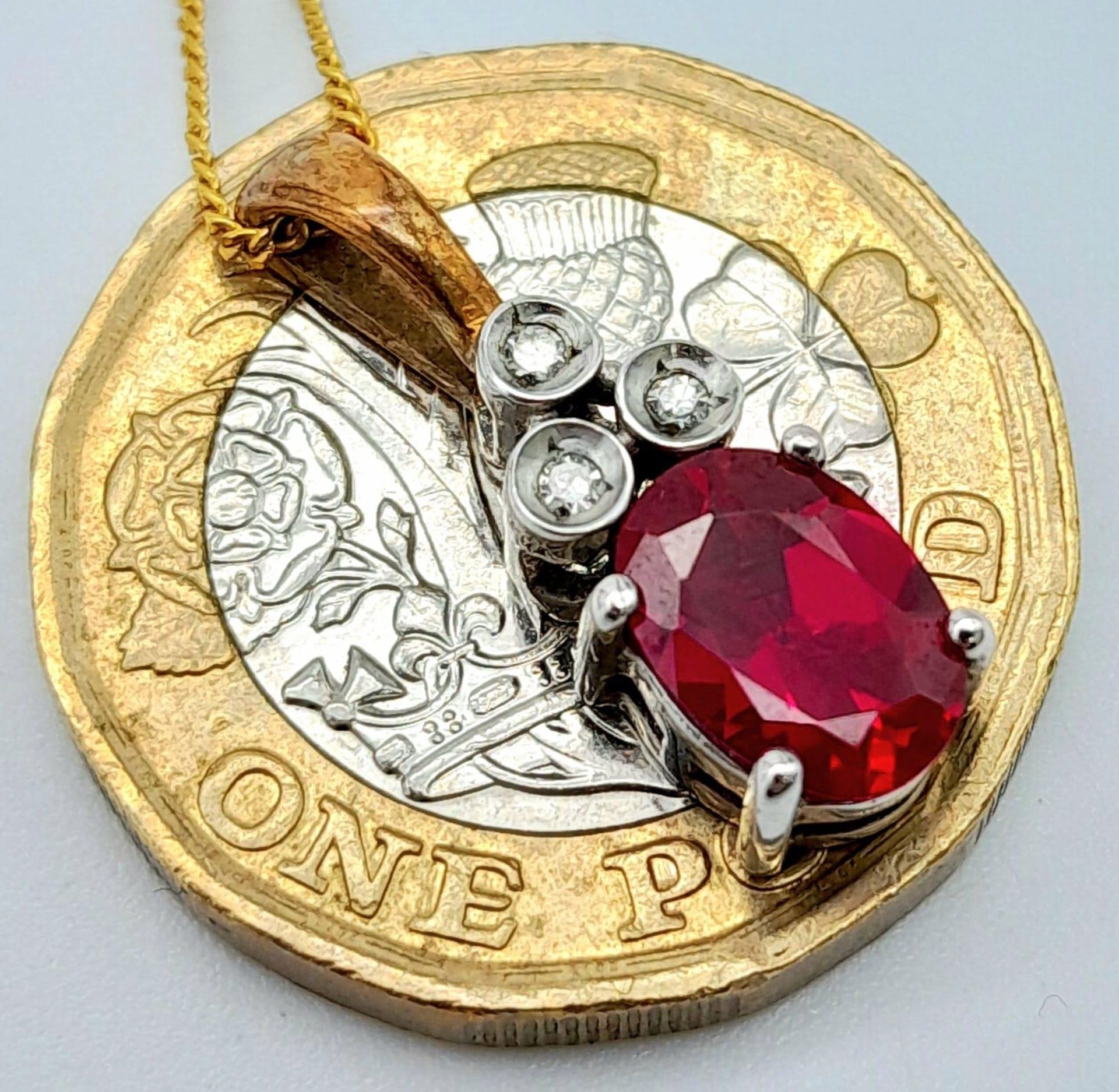 A 9K YELLOW GOLD DIAMOND & RED STONE PENDANT BELIEVED TO BE RUBY & 9K GOLD CHAIN 2.8G , 46cm length. - Image 4 of 6