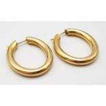 A Classic Pair of Vintage Oval Hoop 9K Yellow Gold Earrings. 6.3g total weight.
