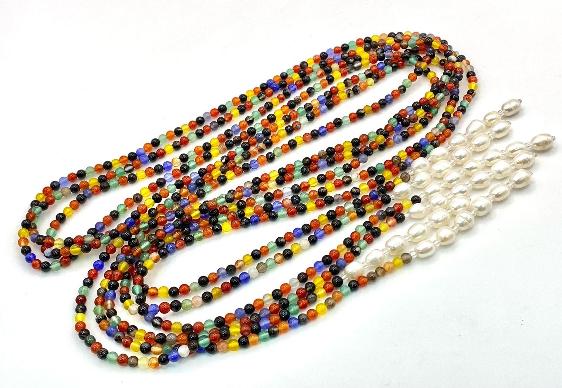 A very interesting necklace consisting of three very long (125 cm) strands of multicoloured beads - Image 2 of 5