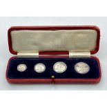 An 1893 Queen Victoria Maundy Money Silver Set of Coins. 1,2,3 and 4d coins. EF but please see