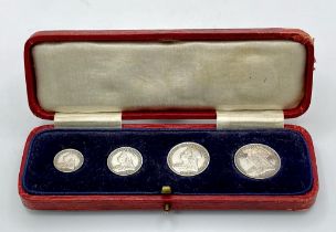 An 1893 Queen Victoria Maundy Money Silver Set of Coins. 1,2,3 and 4d coins. EF but please see