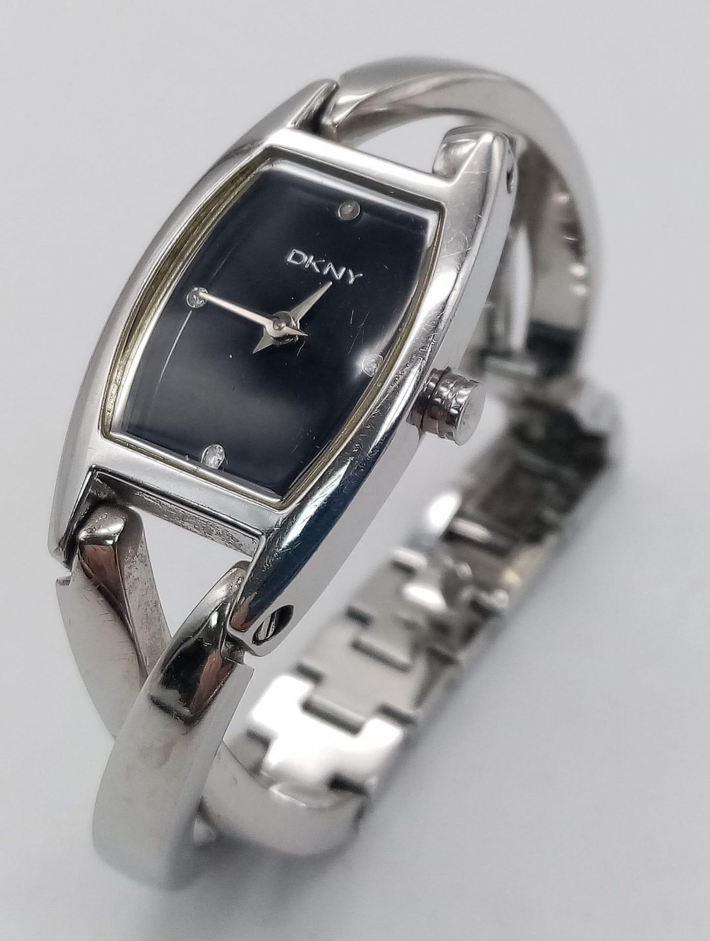 A Designer DKNY Quartz Ladies Watch Stainless steel bracelet and case - 18mm. Black dial. In working