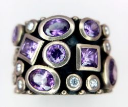 A vintage 925 silver Amethyst and Zirconia stone set Gentlemen ring. Total weight 16.3G. Size R.