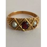 Antique GOLD RING set with Garnet and Seed Pearls. Hallmark rubbed (tests for 18 ct) Size N. 3.6