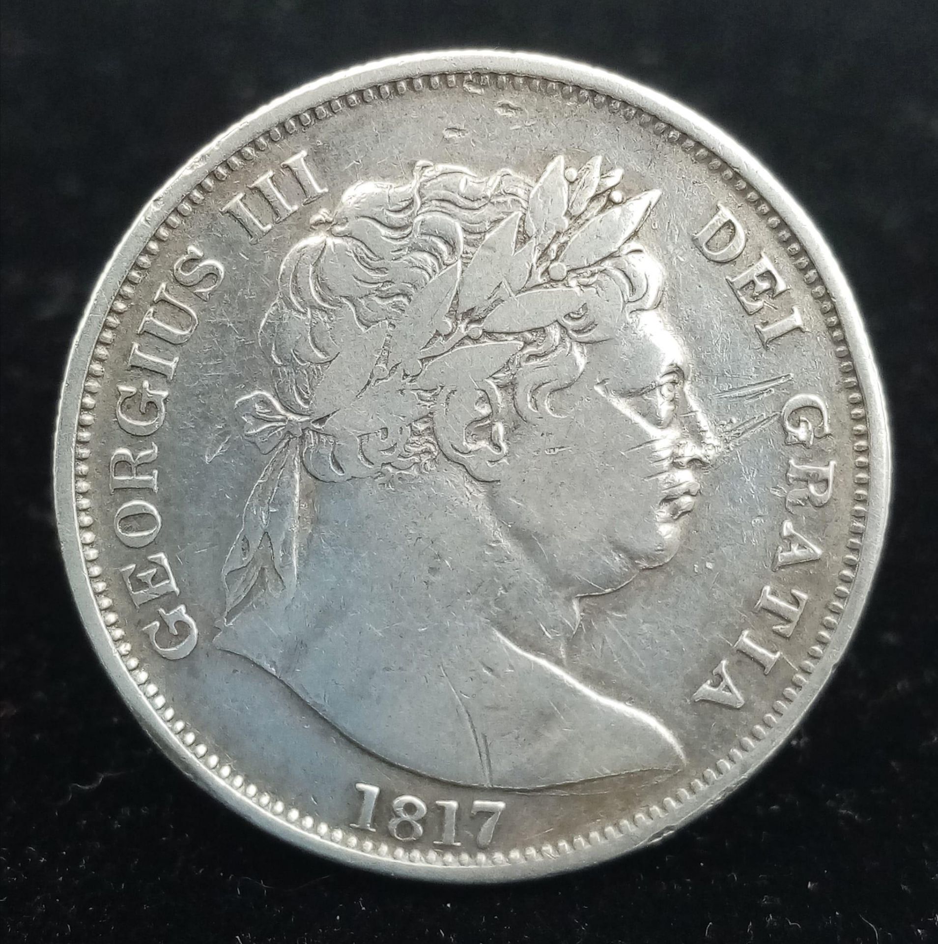 A George III 1817 Half Crown Silver Coin. VF grade but please see photos.