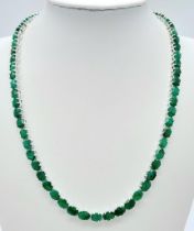 An Emerald Tennis Necklace on 925 Silver. 47cm length, 0.7cm emeralds, 39.62g total weight. Ref: