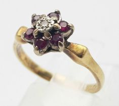 A 18K YELLOW GOLD DIAMOND & RUBY RING. TOTAL WEIGHT 3.2G. SIZE K