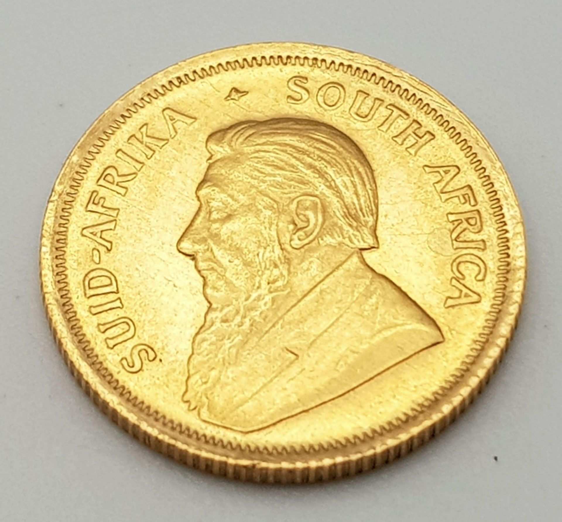 A 1/10 Ounce 22k Gold Krugerrand Coin.