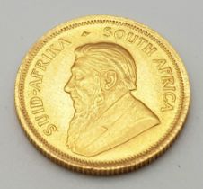 A 1/10 Ounce 22k Gold Krugerrand Coin.